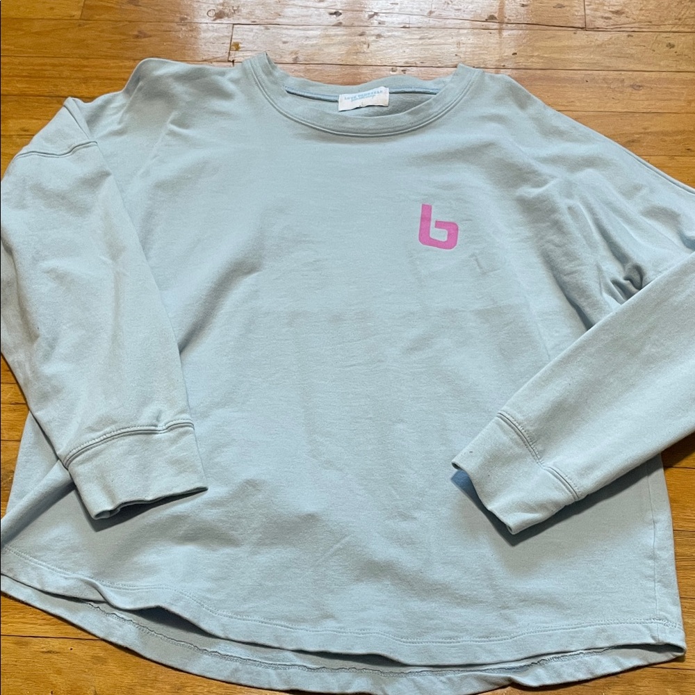 Light Blue Sweatshirt with Pink Logo